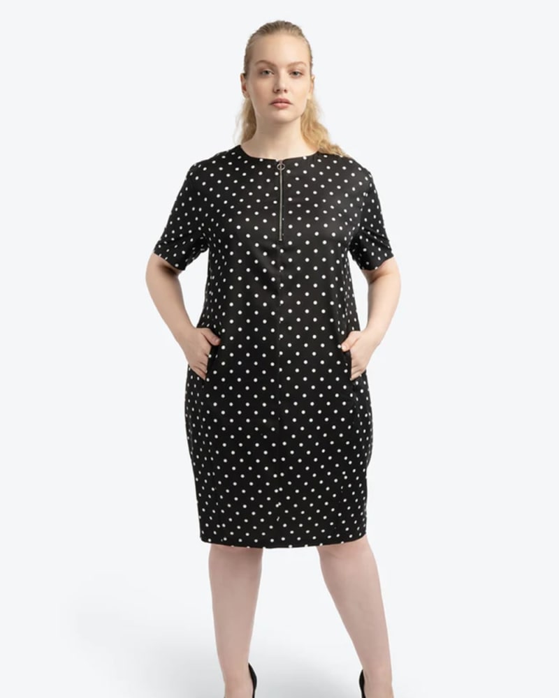 Front of a model wearing a size 2 GO TO MIDI DRESS in Timeless Dot by See Rose Go. | dia_product_style_image_id:316302